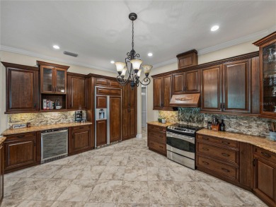 Discover your personal oasis in this stunning 4-bedroom on River Wilderness Golf and Country Club in Florida - for sale on GolfHomes.com, golf home, golf lot