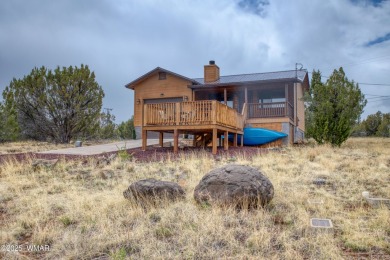 Don't miss this rare opportunity to own this lake view home! on Silver Creek Golf Club in Arizona - for sale on GolfHomes.com, golf home, golf lot