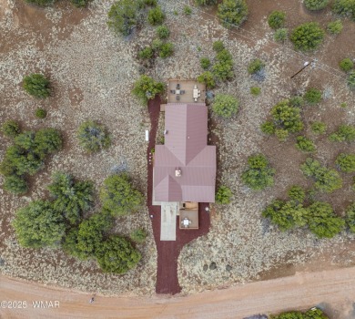 Don't miss this rare opportunity to own this lake view home! on Silver Creek Golf Club in Arizona - for sale on GolfHomes.com, golf home, golf lot