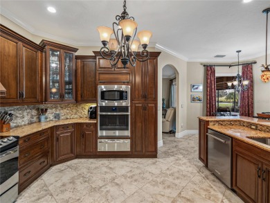 Discover your personal oasis in this stunning 4-bedroom on River Wilderness Golf and Country Club in Florida - for sale on GolfHomes.com, golf home, golf lot