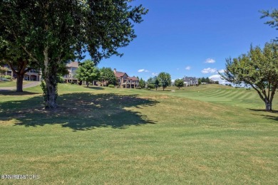 Introducing a picturesque one-level building site nestled within on Rarity Bay Country Club - Loudon in Tennessee - for sale on GolfHomes.com, golf home, golf lot