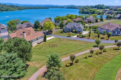 Introducing a picturesque one-level building site nestled within on Rarity Bay Country Club - Loudon in Tennessee - for sale on GolfHomes.com, golf home, golf lot