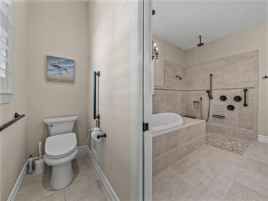 Discover your personal oasis in this stunning 4-bedroom on River Wilderness Golf and Country Club in Florida - for sale on GolfHomes.com, golf home, golf lot