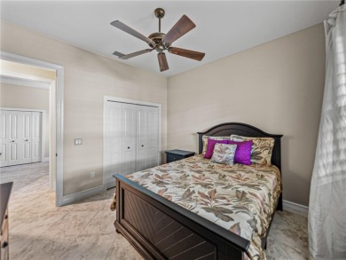 Discover your personal oasis in this stunning 4-bedroom on River Wilderness Golf and Country Club in Florida - for sale on GolfHomes.com, golf home, golf lot