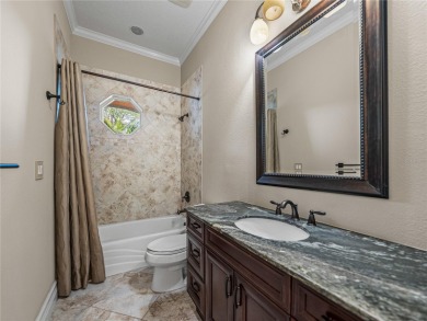 Discover your personal oasis in this stunning 4-bedroom on River Wilderness Golf and Country Club in Florida - for sale on GolfHomes.com, golf home, golf lot