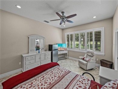 Discover your personal oasis in this stunning 4-bedroom on River Wilderness Golf and Country Club in Florida - for sale on GolfHomes.com, golf home, golf lot