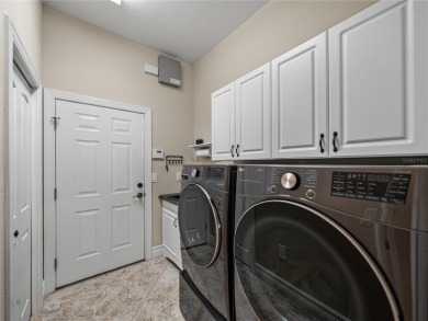 Discover your personal oasis in this stunning 4-bedroom on River Wilderness Golf and Country Club in Florida - for sale on GolfHomes.com, golf home, golf lot