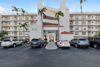 Straight from the pages of Coastal Living, this pristine on Isla Del Sol Yacht and Country Club in Florida - for sale on GolfHomes.com, golf home, golf lot