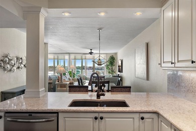 Straight from the pages of Coastal Living, this pristine on Isla Del Sol Yacht and Country Club in Florida - for sale on GolfHomes.com, golf home, golf lot