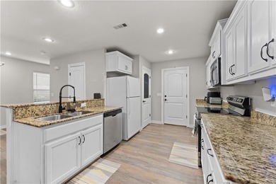 Welcome to this updated 1,480 square foot home in the wooded on Bella Vista - Metfield Golf Complex and Country Club in Arkansas - for sale on GolfHomes.com, golf home, golf lot