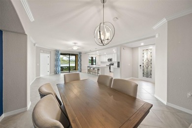 Please enjoy this beautifully upgraded first floor end unit on Sarasota National Golf Club in Florida - for sale on GolfHomes.com, golf home, golf lot