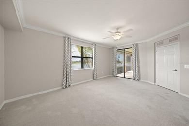 Please enjoy this beautifully upgraded first floor end unit on Sarasota National Golf Club in Florida - for sale on GolfHomes.com, golf home, golf lot