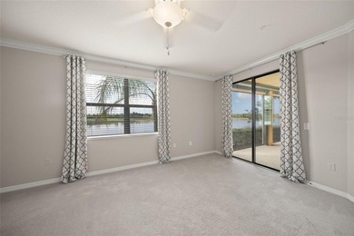 Please enjoy this beautifully upgraded first floor end unit on Sarasota National Golf Club in Florida - for sale on GolfHomes.com, golf home, golf lot