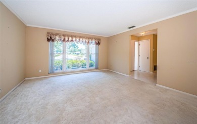 Honey, stop the car! This 2-bedroom, 2-bathroom home sits on a on Countryside Country Club in Florida - for sale on GolfHomes.com, golf home, golf lot