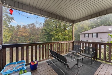 Welcome to this updated 1,480 square foot home in the wooded on Bella Vista - Metfield Golf Complex and Country Club in Arkansas - for sale on GolfHomes.com, golf home, golf lot