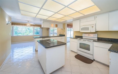 Honey, stop the car! This 2-bedroom, 2-bathroom home sits on a on Countryside Country Club in Florida - for sale on GolfHomes.com, golf home, golf lot