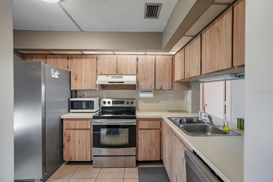 Under contract-accepting backup offers. Beautiful water views on Isla Del Sol Yacht and Country Club in Florida - for sale on GolfHomes.com, golf home, golf lot