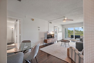 Under contract-accepting backup offers. Beautiful water views on Isla Del Sol Yacht and Country Club in Florida - for sale on GolfHomes.com, golf home, golf lot