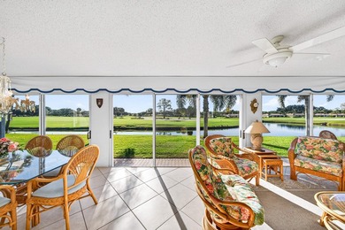 Beautiful villa with sweeping lake and golf course views on Quail Ridge Golf Course and Country Club in Florida - for sale on GolfHomes.com, golf home, golf lot