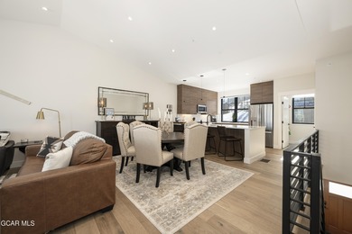 This luxurious townhome can be seen rising above the Granby on Headwaters Golf Course At Granby Ranch in Colorado - for sale on GolfHomes.com, golf home, golf lot