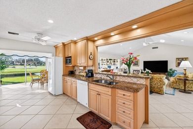 Beautiful villa with sweeping lake and golf course views on Quail Ridge Golf Course and Country Club in Florida - for sale on GolfHomes.com, golf home, golf lot