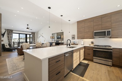 This luxurious townhome can be seen rising above the Granby on Headwaters Golf Course At Granby Ranch in Colorado - for sale on GolfHomes.com, golf home, golf lot