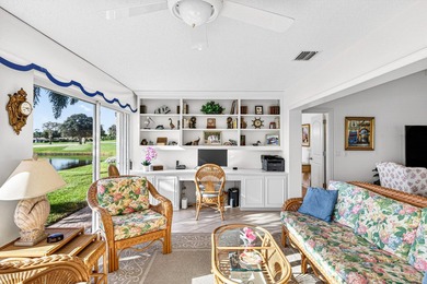 Beautiful villa with sweeping lake and golf course views on Quail Ridge Golf Course and Country Club in Florida - for sale on GolfHomes.com, golf home, golf lot