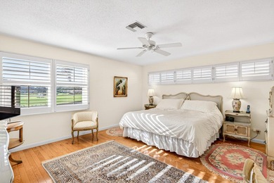 Beautiful villa with sweeping lake and golf course views on Quail Ridge Golf Course and Country Club in Florida - for sale on GolfHomes.com, golf home, golf lot