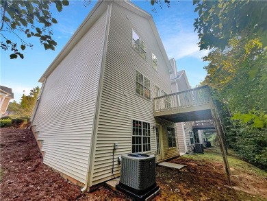 Spacious family home featuring an inviting family room with a on Mystery Valley Golf Course in Georgia - for sale on GolfHomes.com, golf home, golf lot