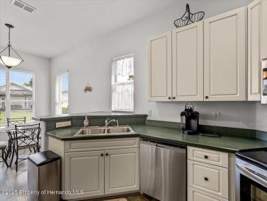 Located in Glen Lakes, this 2003 Addison Audubon maintenance on Glen Lakes Country Club in Florida - for sale on GolfHomes.com, golf home, golf lot