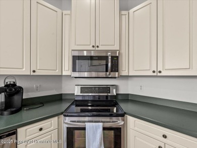 Located in Glen Lakes, this 2003 Addison Audubon maintenance on Glen Lakes Country Club in Florida - for sale on GolfHomes.com, golf home, golf lot