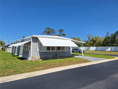 Under contract-accepting backup offers. PRICE REDUCED! This on Tarpon Springs Golf Course in Florida - for sale on GolfHomes.com, golf home, golf lot