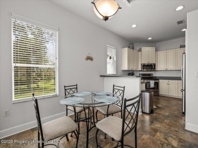Located in Glen Lakes, this 2003 Addison Audubon maintenance on Glen Lakes Country Club in Florida - for sale on GolfHomes.com, golf home, golf lot