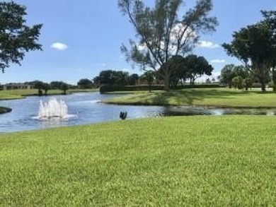 Great Location! True 1st floor with fabulous canal view on side on Kings Point Golf -Flanders Way in Florida - for sale on GolfHomes.com, golf home, golf lot