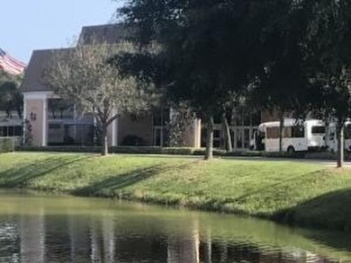 Great Location! True 1st floor with fabulous canal view on side on Kings Point Golf -Flanders Way in Florida - for sale on GolfHomes.com, golf home, golf lot