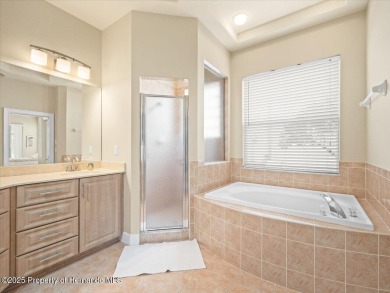 Located in Glen Lakes, this 2003 Addison Audubon maintenance on Glen Lakes Country Club in Florida - for sale on GolfHomes.com, golf home, golf lot