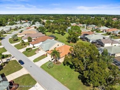 Located in Glen Lakes, this 2003 Addison Audubon maintenance on Glen Lakes Country Club in Florida - for sale on GolfHomes.com, golf home, golf lot
