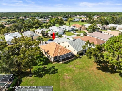 Located in Glen Lakes, this 2003 Addison Audubon maintenance on Glen Lakes Country Club in Florida - for sale on GolfHomes.com, golf home, golf lot
