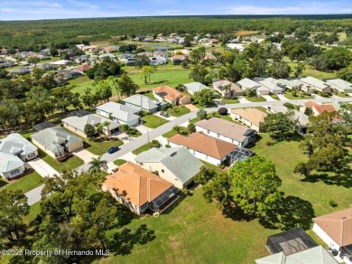 Located in Glen Lakes, this 2003 Addison Audubon maintenance on Glen Lakes Country Club in Florida - for sale on GolfHomes.com, golf home, golf lot