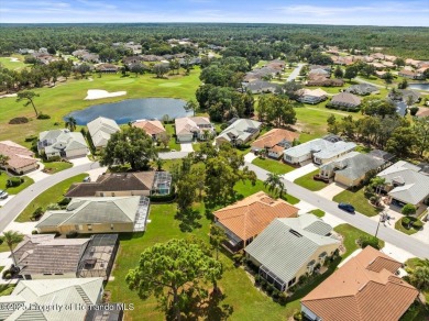 Located in Glen Lakes, this 2003 Addison Audubon maintenance on Glen Lakes Country Club in Florida - for sale on GolfHomes.com, golf home, golf lot