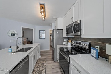 Beautifully updated and located in the highly desired Brunswick on Brunswick Plantation and Golf Resorts in North Carolina - for sale on GolfHomes.com, golf home, golf lot