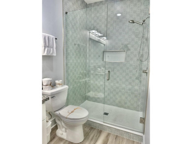 Located 1/2 MILE from sugar white sand beaches and pristine on Sharks Tooth Golf Club in Florida - for sale on GolfHomes.com, golf home, golf lot