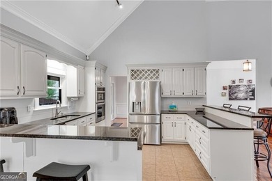 Resort-style living awaits in this beautifully appointed on Royal Lakes Golf and Country Club in Georgia - for sale on GolfHomes.com, golf home, golf lot