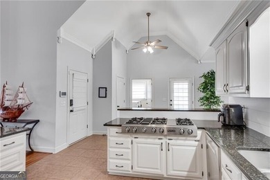 Resort-style living awaits in this beautifully appointed on Royal Lakes Golf and Country Club in Georgia - for sale on GolfHomes.com, golf home, golf lot