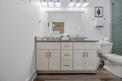 Located 1/2 MILE from sugar white sand beaches and pristine on Sharks Tooth Golf Club in Florida - for sale on GolfHomes.com, golf home, golf lot