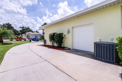 Welcome to your dream home in the prestigious Huntington Hills on Huntington Hills Golf and Country Club in Florida - for sale on GolfHomes.com, golf home, golf lot