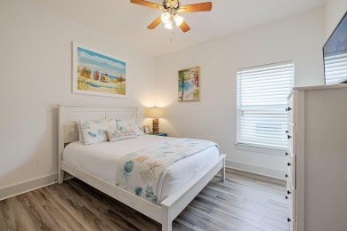 Located 1/2 MILE from sugar white sand beaches and pristine on Sharks Tooth Golf Club in Florida - for sale on GolfHomes.com, golf home, golf lot