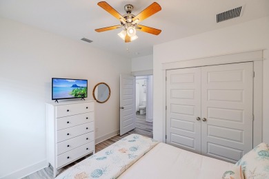 Located 1/2 MILE from sugar white sand beaches and pristine on Sharks Tooth Golf Club in Florida - for sale on GolfHomes.com, golf home, golf lot