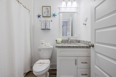 Located 1/2 MILE from sugar white sand beaches and pristine on Sharks Tooth Golf Club in Florida - for sale on GolfHomes.com, golf home, golf lot