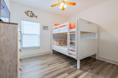 Located 1/2 MILE from sugar white sand beaches and pristine on Sharks Tooth Golf Club in Florida - for sale on GolfHomes.com, golf home, golf lot